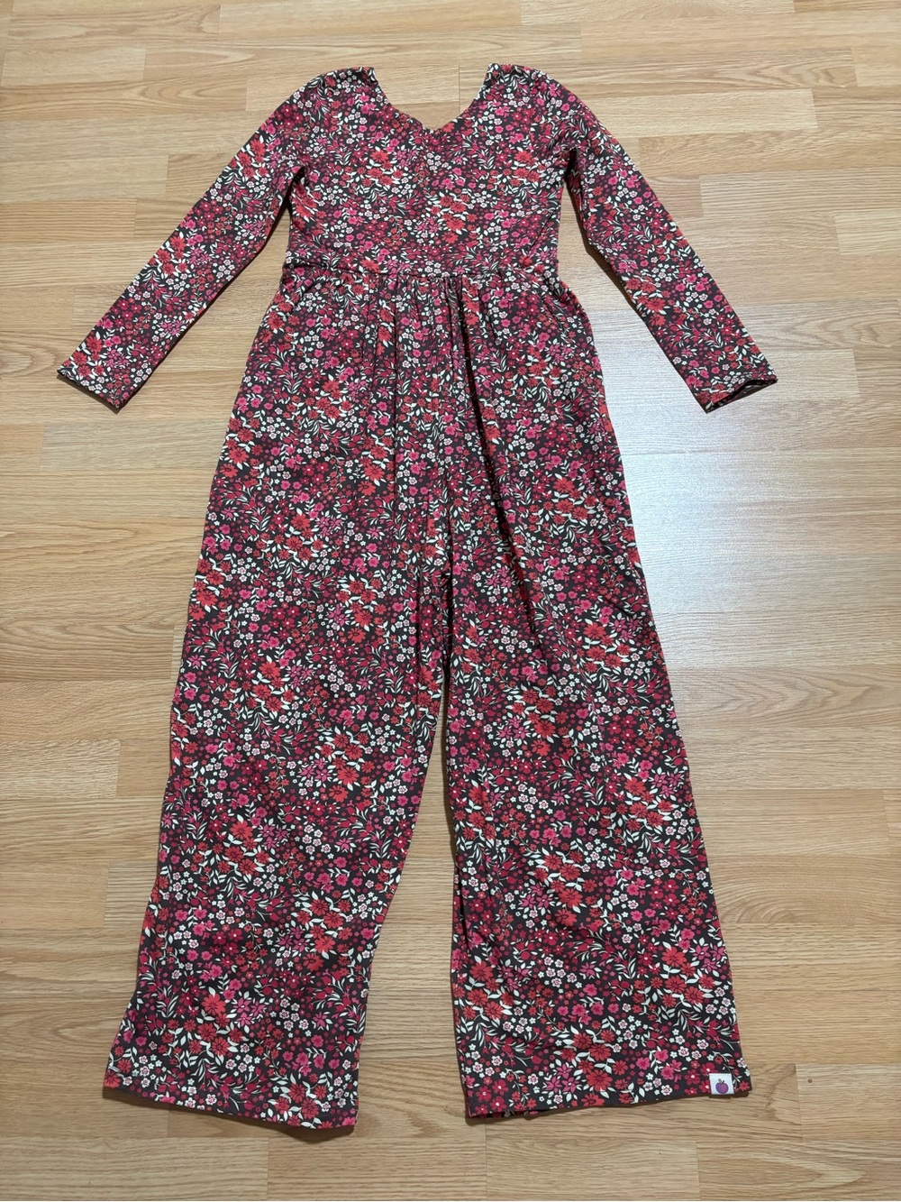 New “Cheeky Plum” leggy romper size 12 without tag